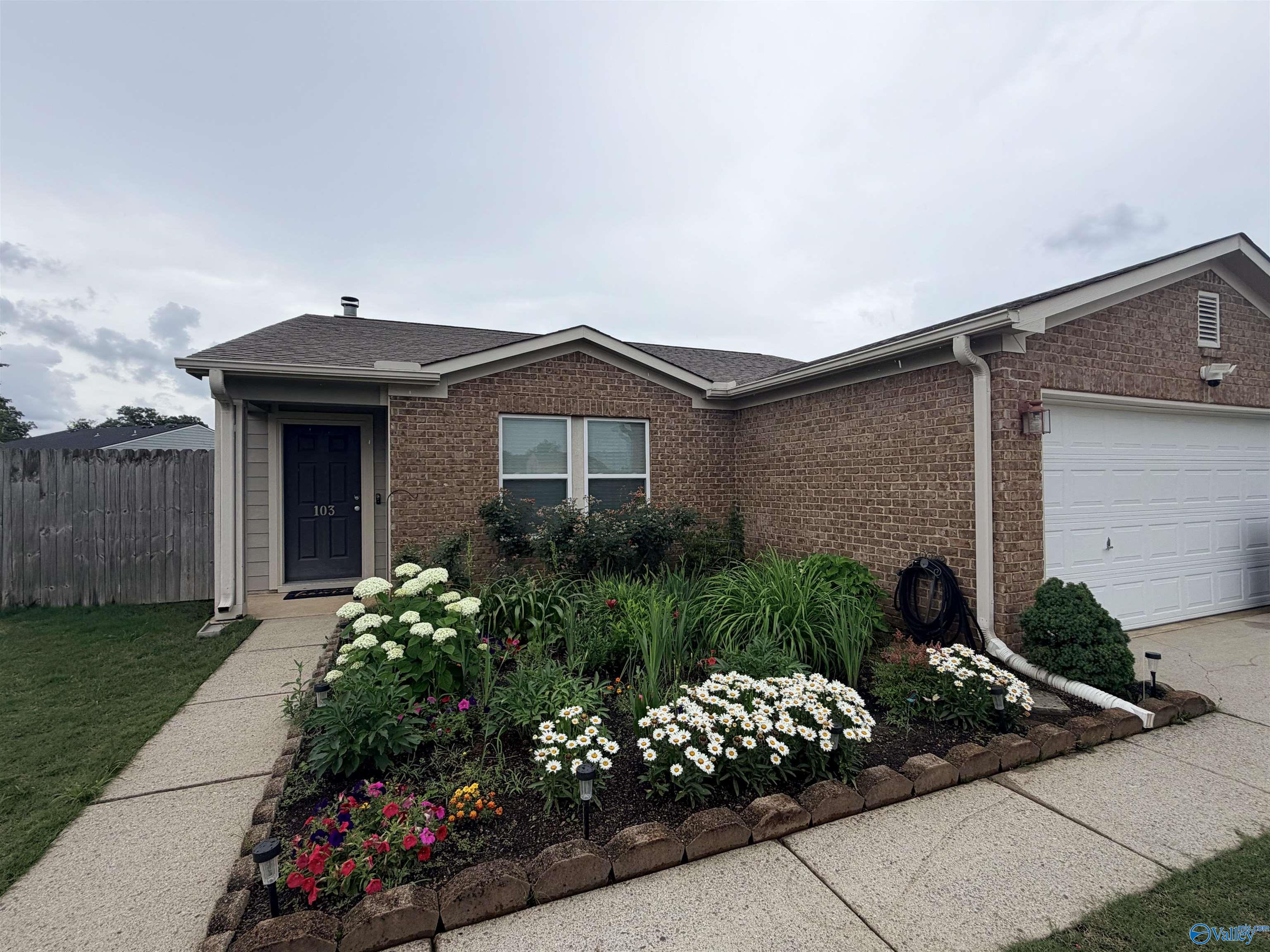 103 Coach Glen Drive