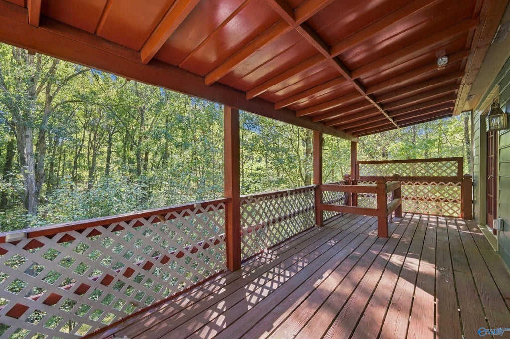 Back deck surrounded by trees