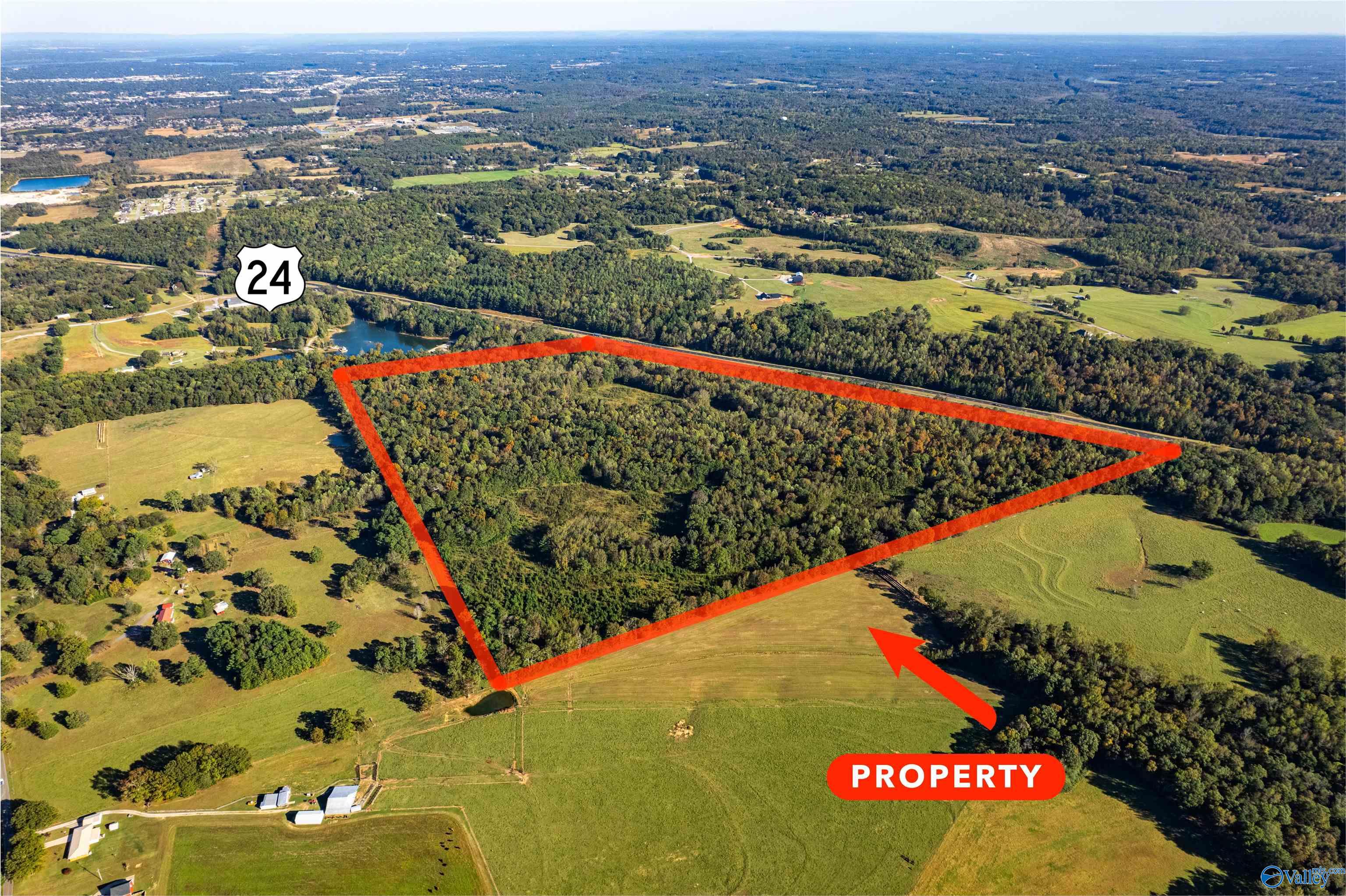 125 +/- acres Hwy 24