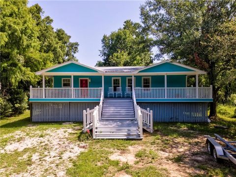 Photo of 720 Bienville Boulevard, Dauphin Island, AL 36528 (MLS # 7602167)