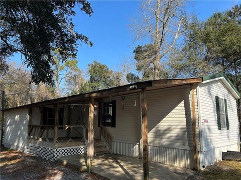 Photo of 8420 E Rabby Street, Bayou La Batre, AL 36509 (MLS # 7700625)