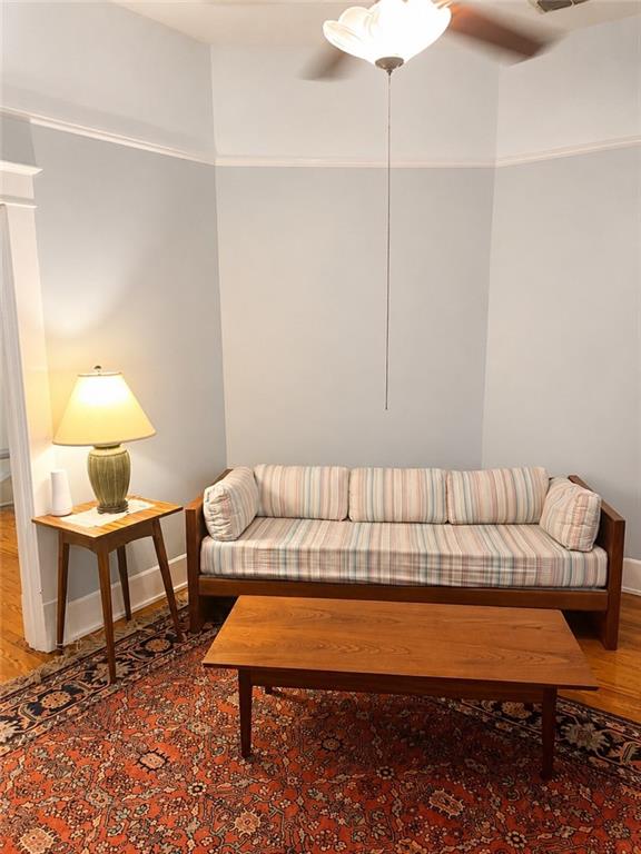 Living room area with hardwood floors