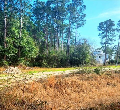 Photo of 0 Fort Morgan Road W, Gulf Shores, AL 36542 (MLS # 7730767)