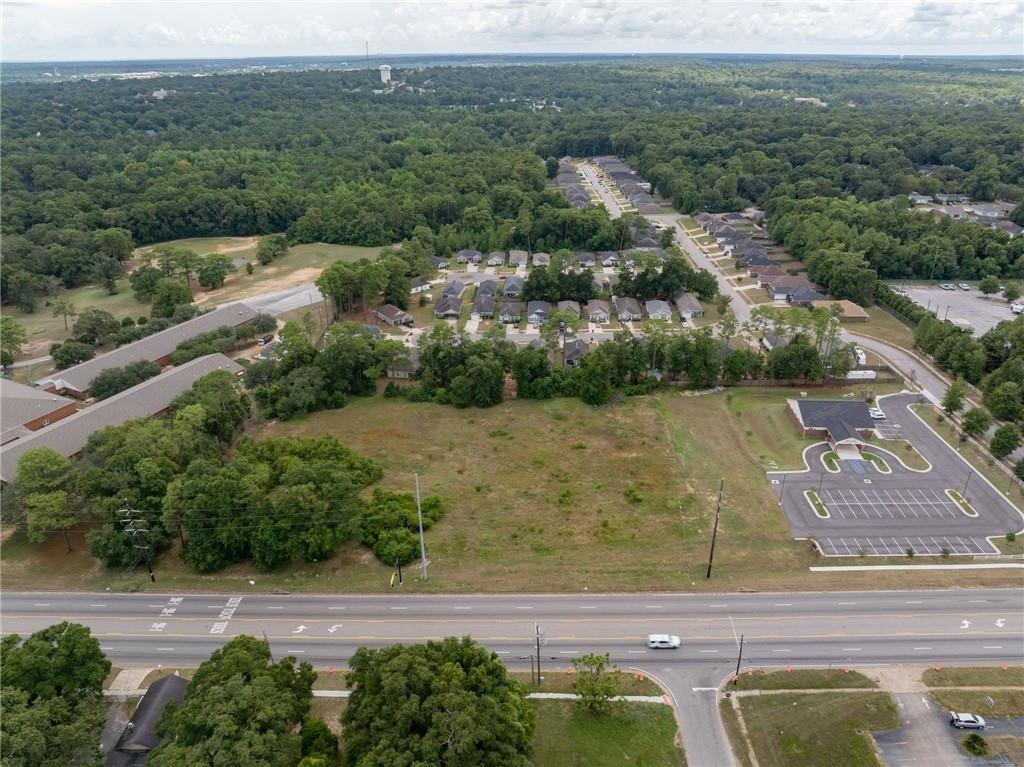 View of property location with a forest