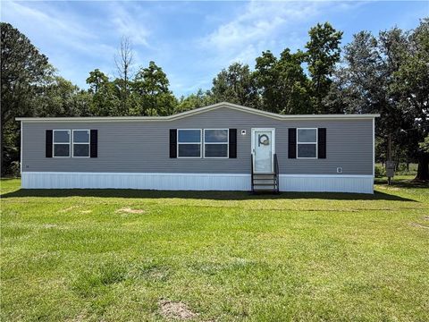 Photo of 5700 Gus Broughton Road, Grand Bay, AL 36541 (MLS # 7773114)