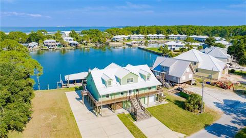 Photo of 310 Cavalier Drive, Dauphin Island, AL 36590 (MLS # 7745647)