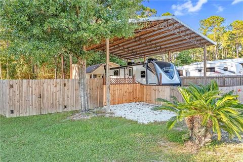 Photo of 182 Defuniak Loop, Lillian, AL 36549 (MLS # 7672545) Photo of 182 Defuniak Loop, Lillian, AL 36549 (MLS # 7672545)