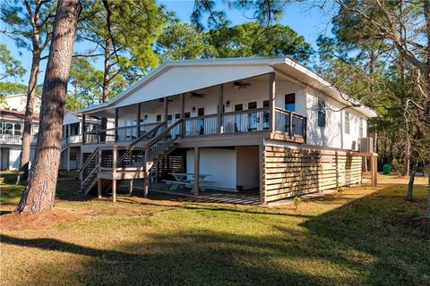 Photo of 1426 Cadillac Avenue, Dauphin Island, AL 36528 (MLS # 7668629) Photo of 1426 Cadillac Avenue, Dauphin Island, AL 36528 (MLS # 7668629)