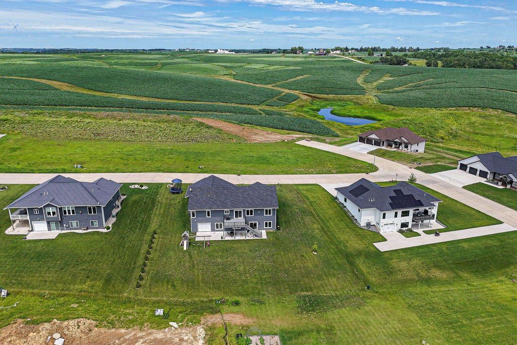Photo of 8166 Tegan Drive, Peosta, IA 52068 (MLS # 153031)