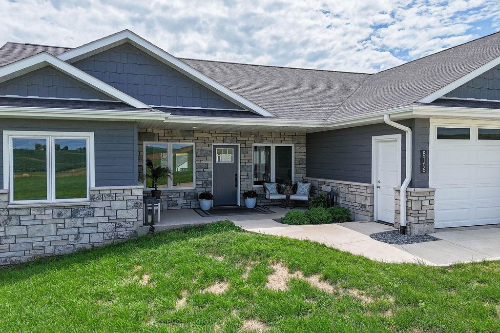 Photo of 8166 Tegan Drive, Peosta, IA 52068 (MLS # 153031)