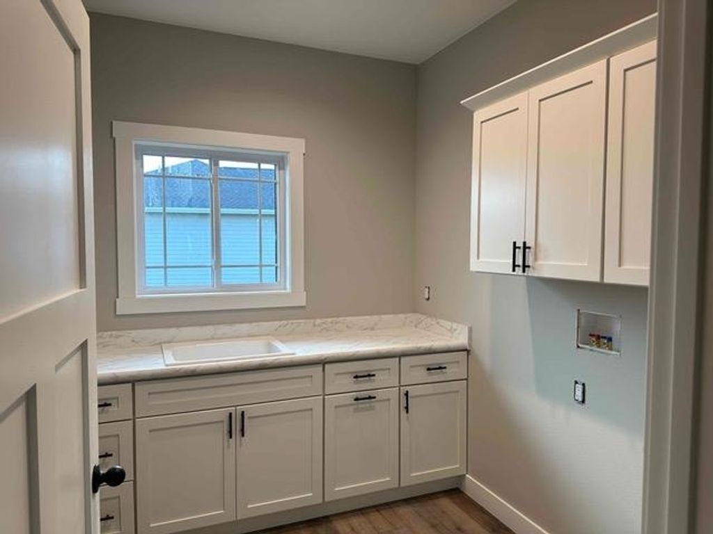 Photo of 8202 Hugo Drive, Peosta, IA 52068 (MLS # 153654)