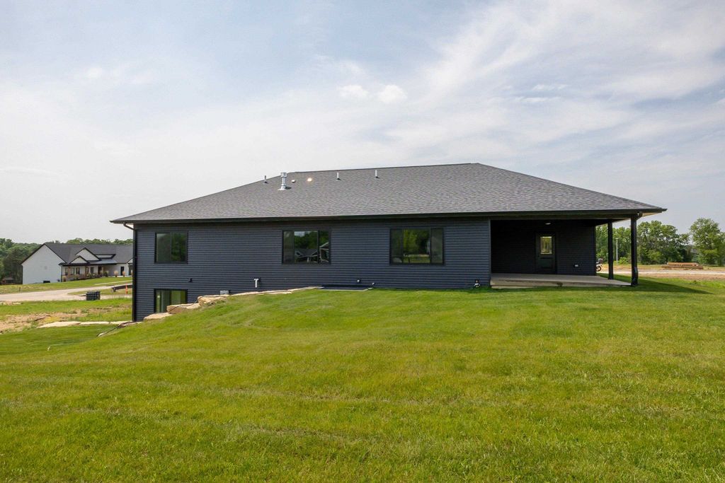 Photo of 2461 Whisper Woods Lane, Dubuque, IA 52003 (MLS # 153749)