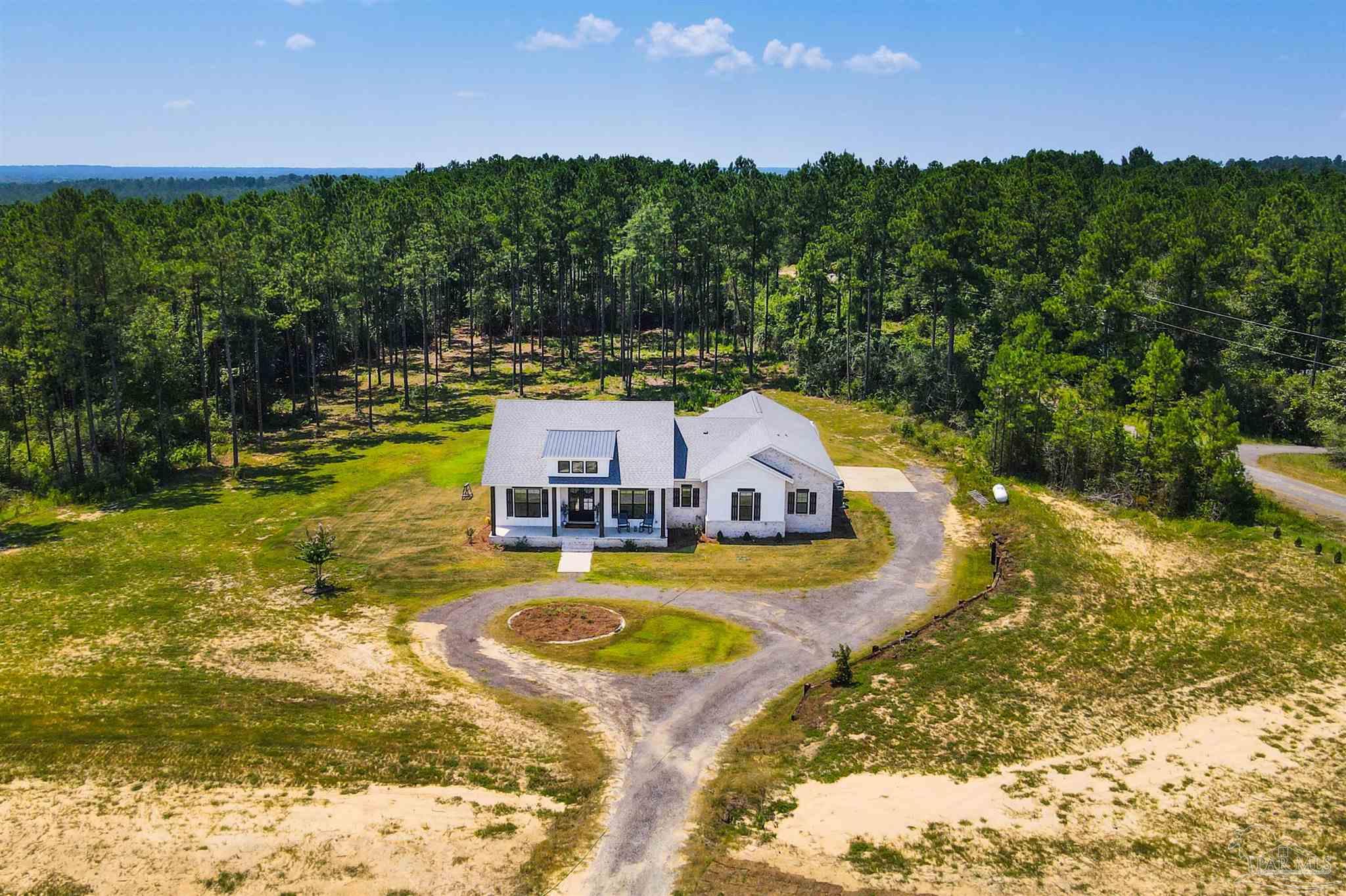 Photo 1 of 38 — 2065 Ten Mile Rd, Pace, FL 32571