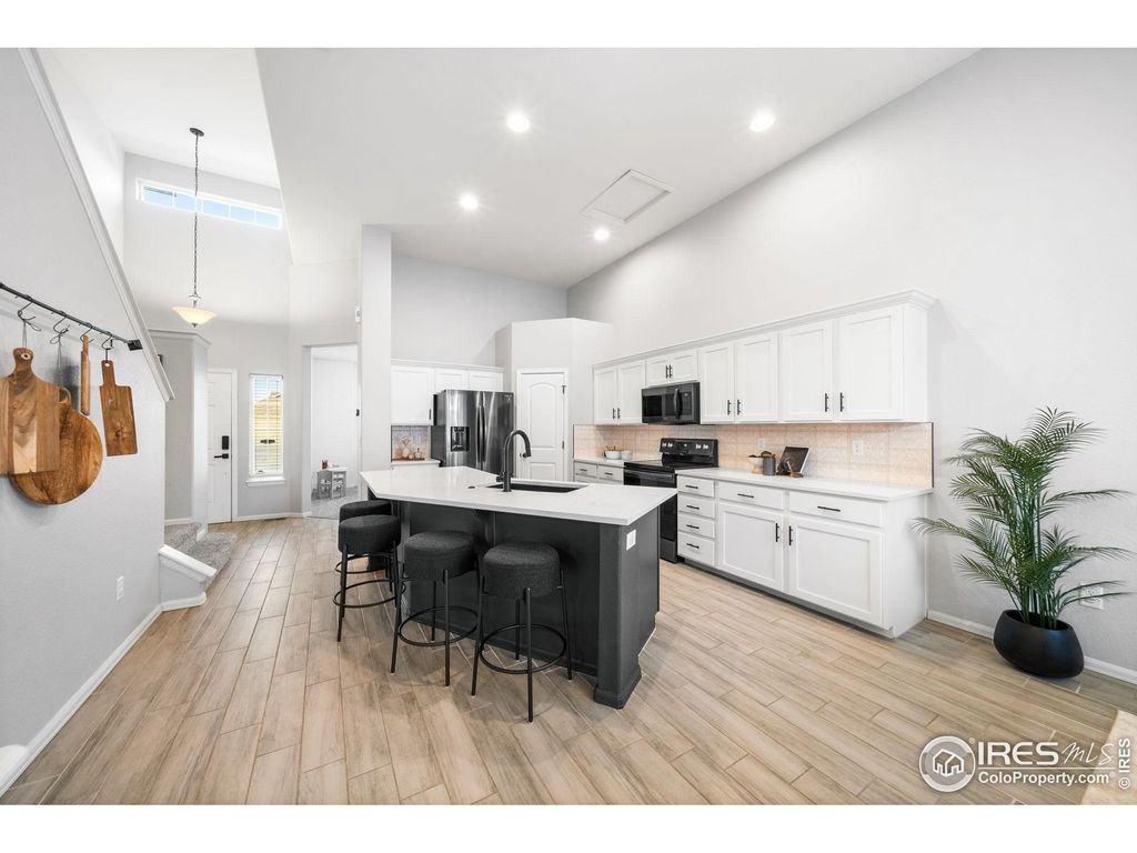 Photo of 1521 Woodcock St, Berthoud, CO 80513 (MLS # 1048424)