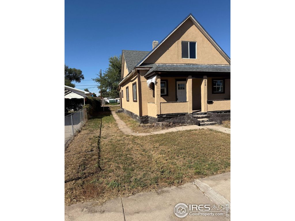 Photo of 408 Douglas St, Sterling, CO 80751 (MLS # 1045713)