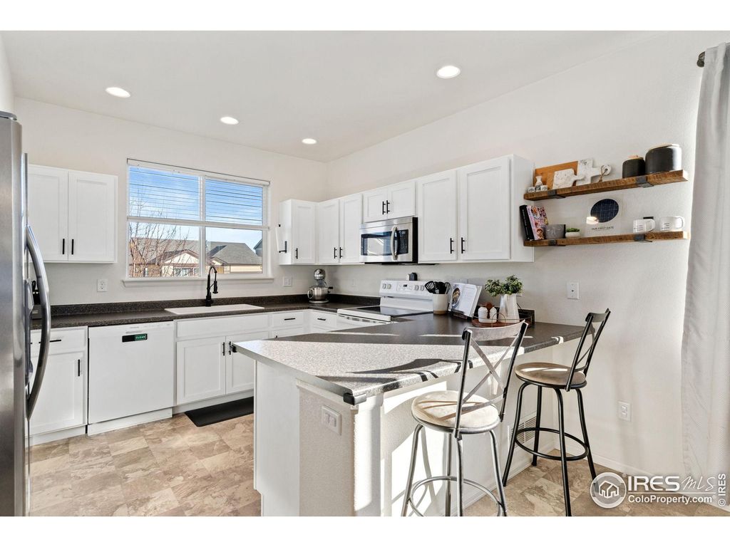 Photo of 2004 Thundercloud Dr, Windsor, CO 80550 (MLS # 1048352)