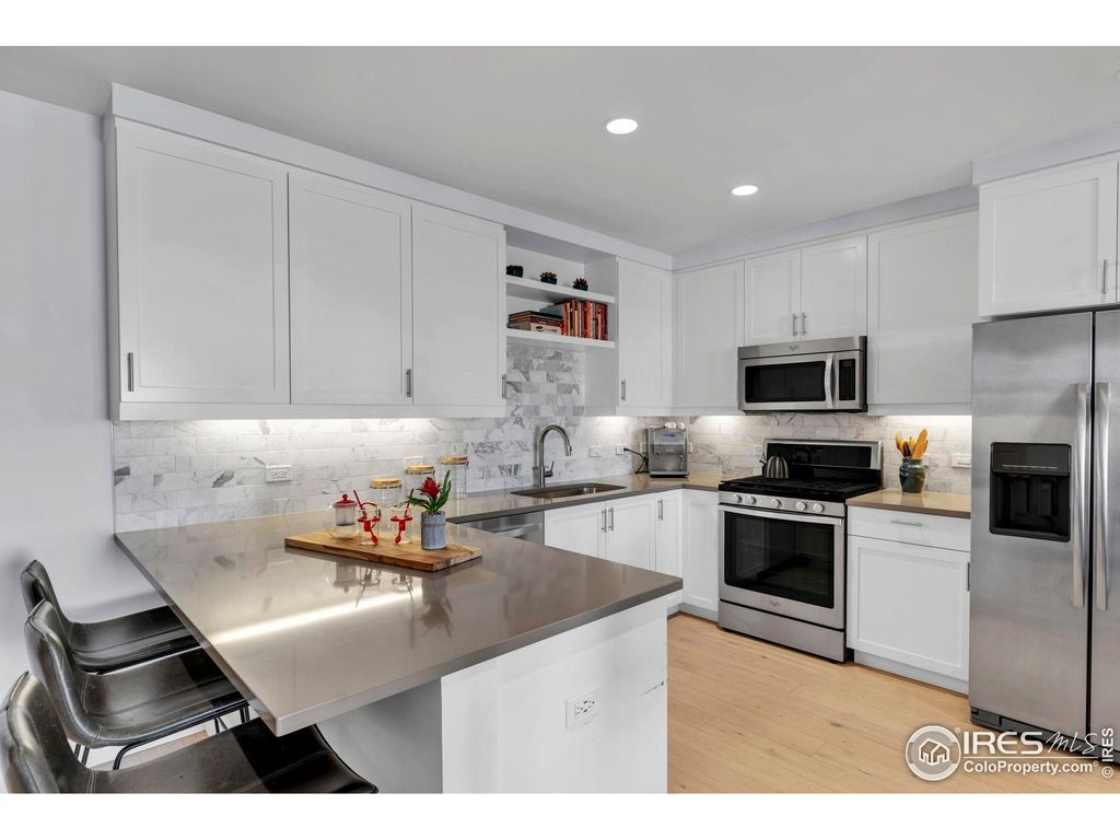 Photo of 3301 Arapahoe Ave 413, Boulder, CO 80303 (MLS # 1045362)