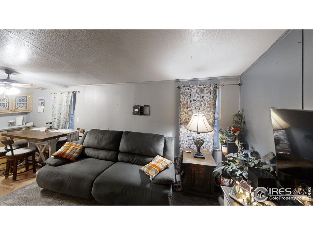 Photo of 804 Warren St, Weldona, CO 80653 (MLS # 1048120)