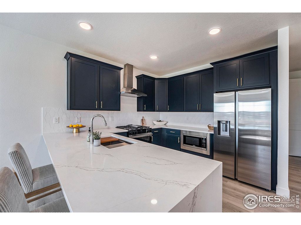 Photo of 5001 Avon Ave, Loveland, CO 80538 (MLS # 1047946)