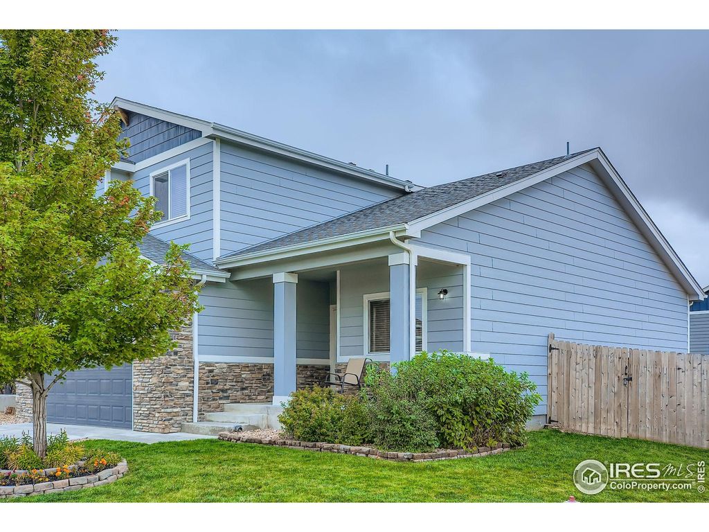 Photo of 805 Pioneer Dr, Milliken, CO 80543 (MLS # 1047903)