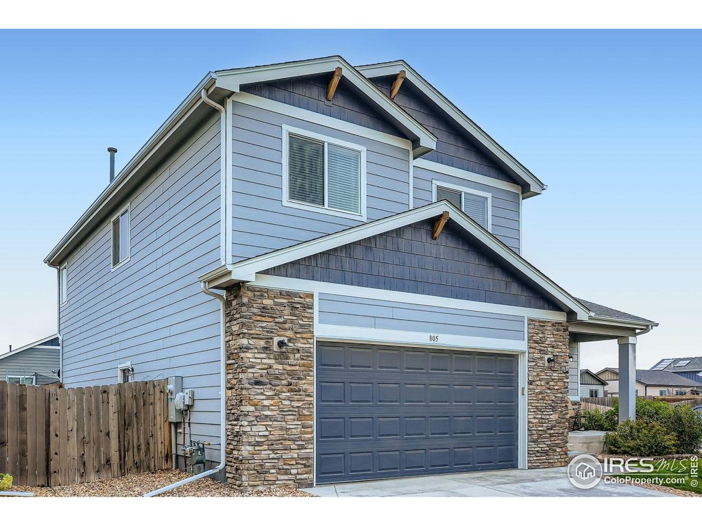 Photo of 805 Pioneer Dr, Milliken, CO 80543 (MLS # 1047903)