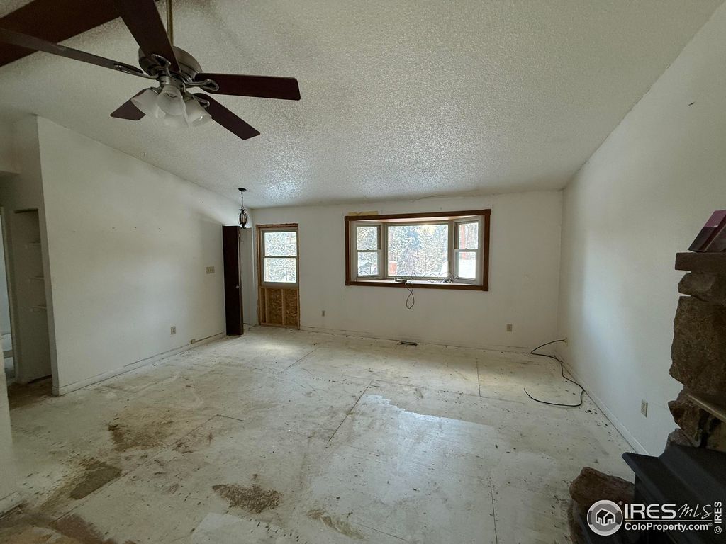 Photo of 26360 Mowbray Ct, Kittredge, CO 80457 (MLS # 1048199)