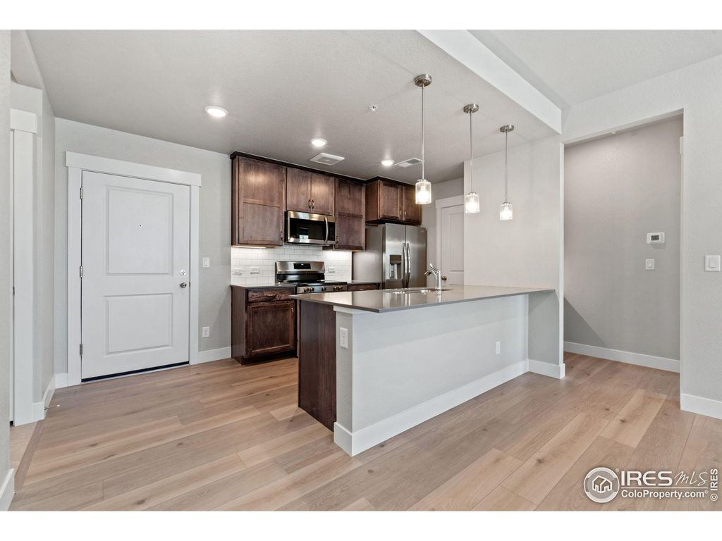 Photo of 4260 Vulcan Creek Dr 205, Loveland, CO 80538 (MLS # 1045727)