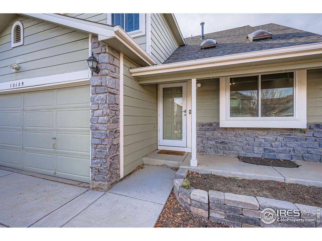 Photo of 12129 Forest St, Thornton, CO 80241 (MLS # 1047887)