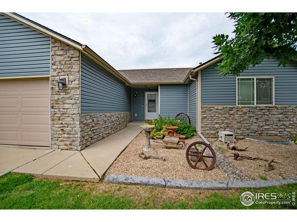 Photo of 6937 Raleigh St, Wellington, CO 80549 (MLS # 1048428)