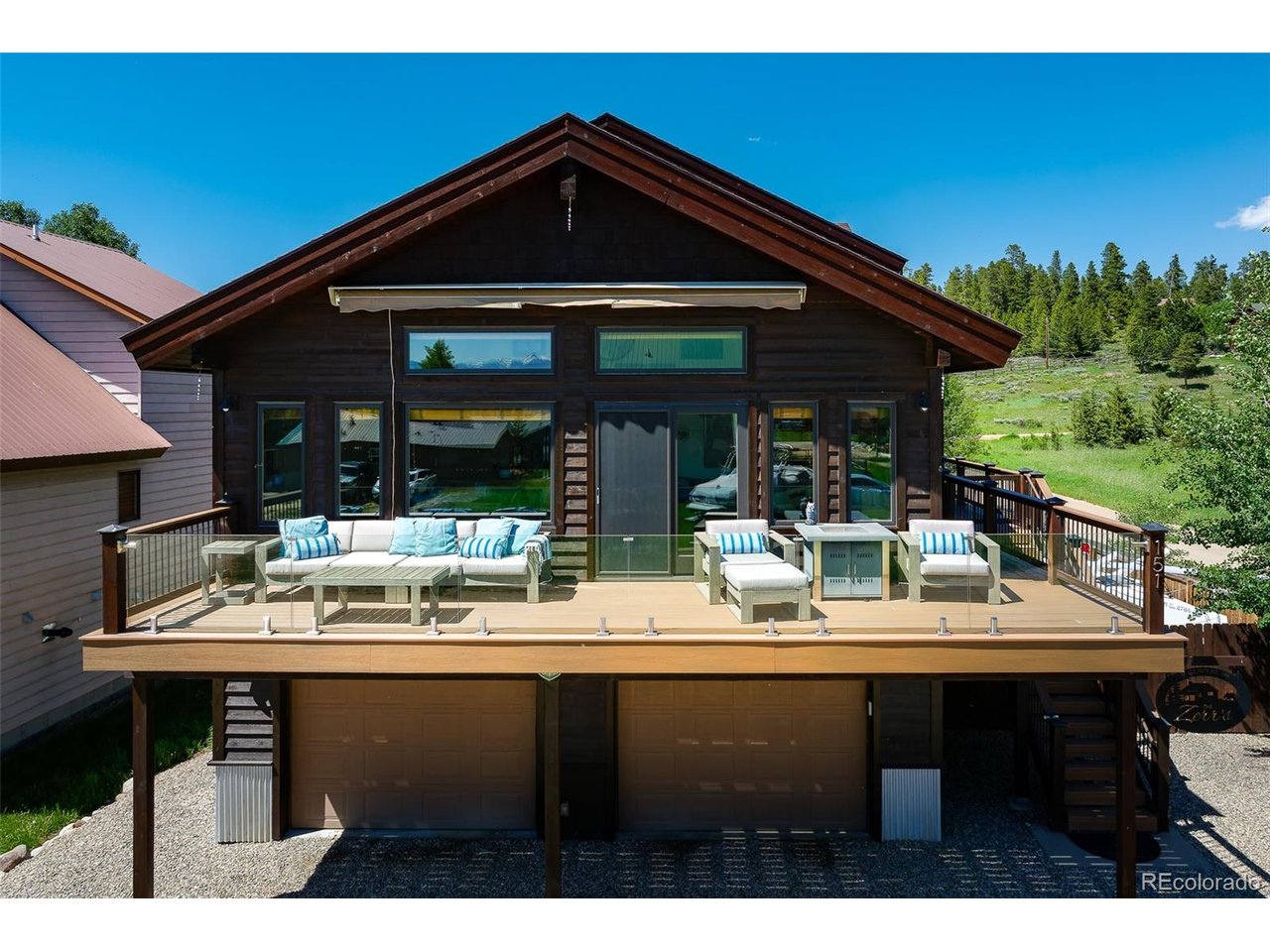 front of home featuring large wrap around deck