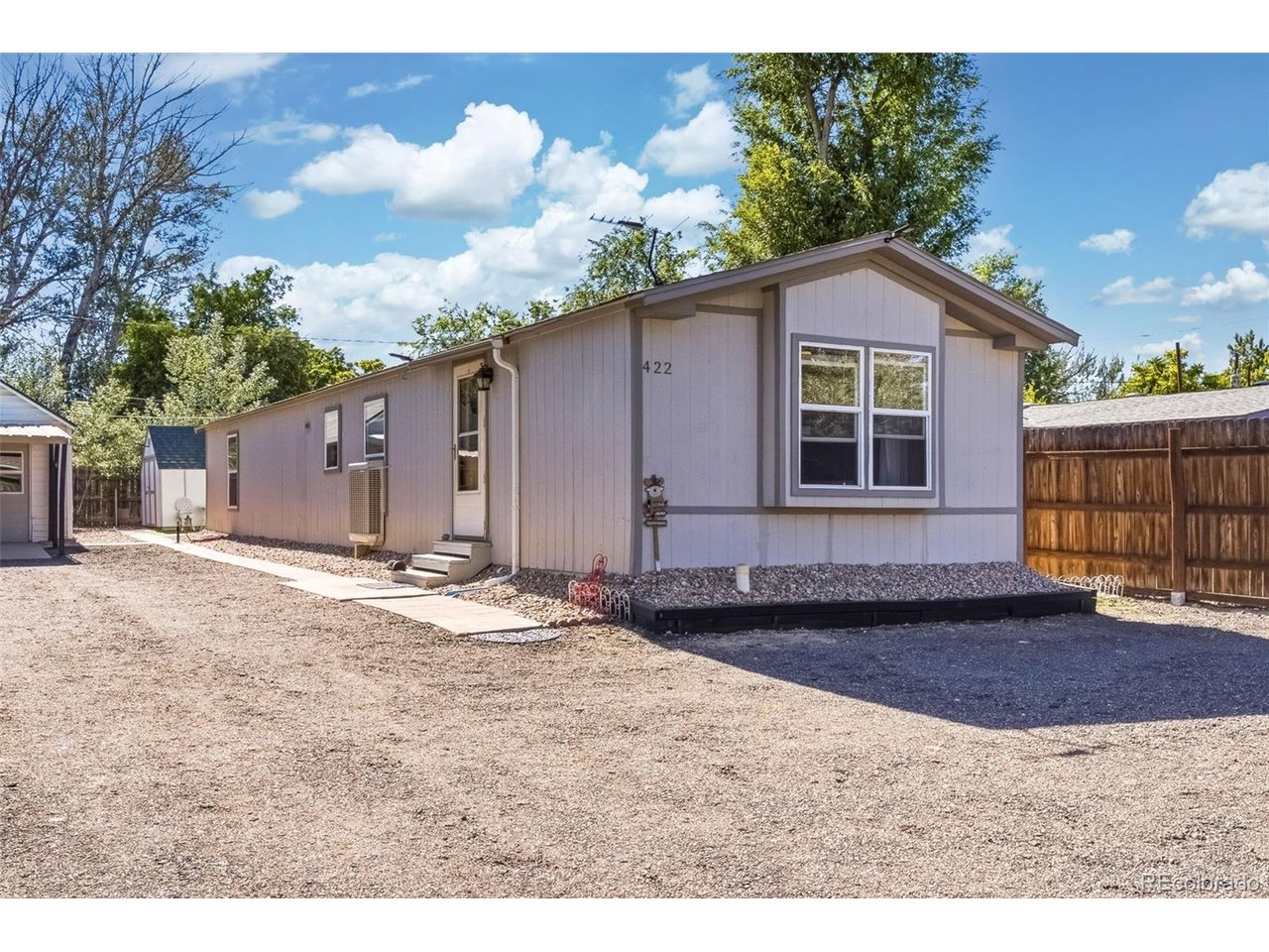 Photo 1 of 19 — 422 Willow Dr, Brighton, CO 80603