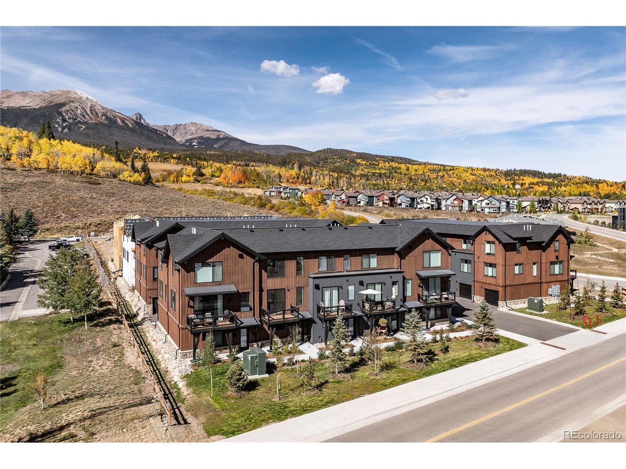 View of development. Unit 120 will have views of Red Peak and Mount Silverthorne featured in this photo