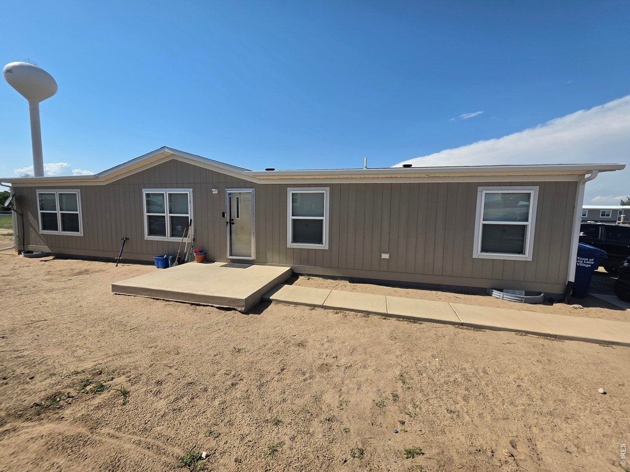 Photo 1 of 12 — 209 Larch Dr, Log Lane Village, CO 80705