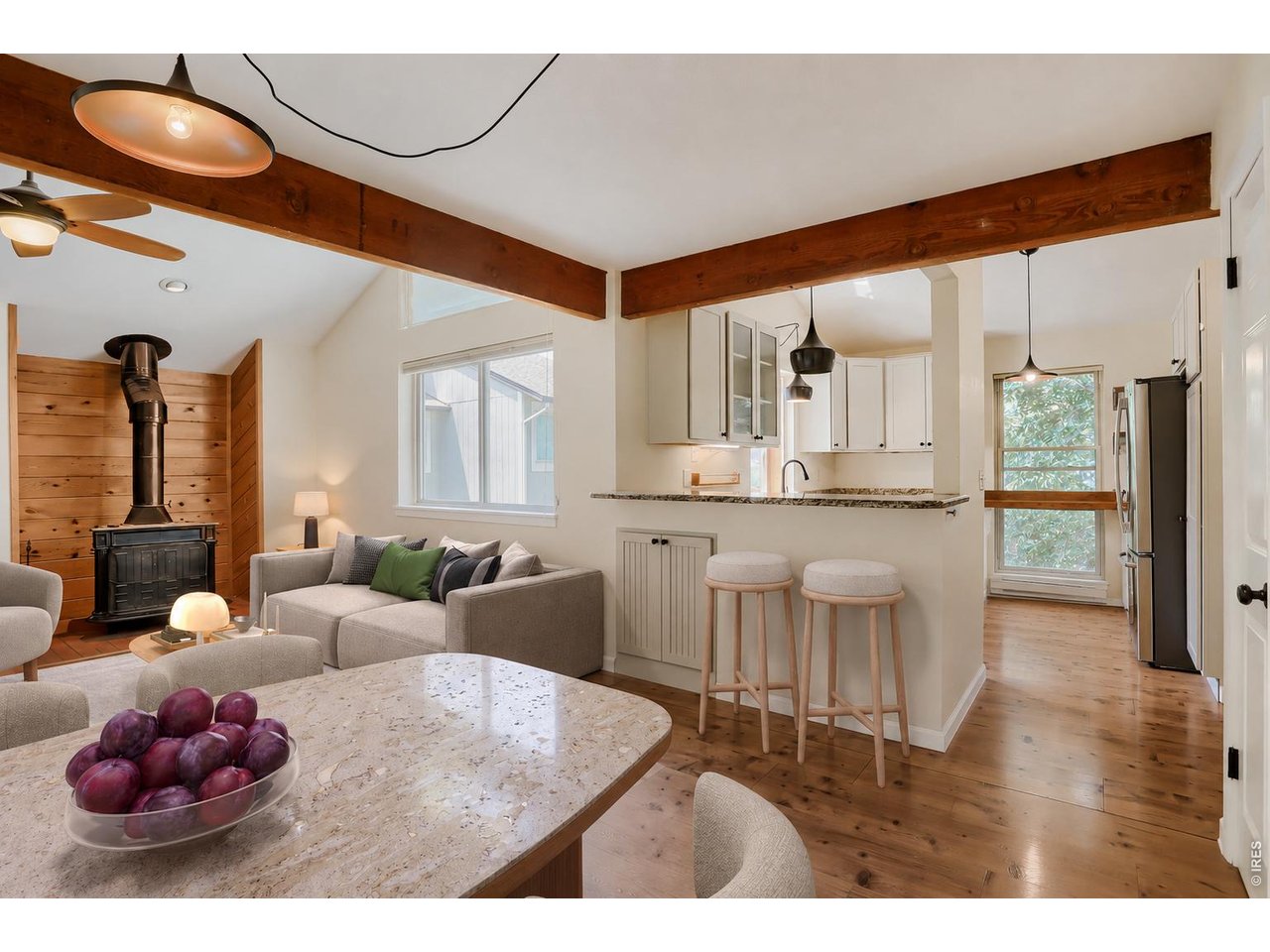 Kitchen, dining and living room, all open to one bright sunny space
