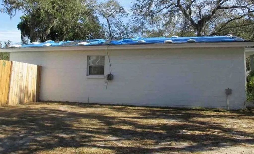 Photo of 10002 Takomah Trail, Tampa, FL 33617 (MLS # 398966)