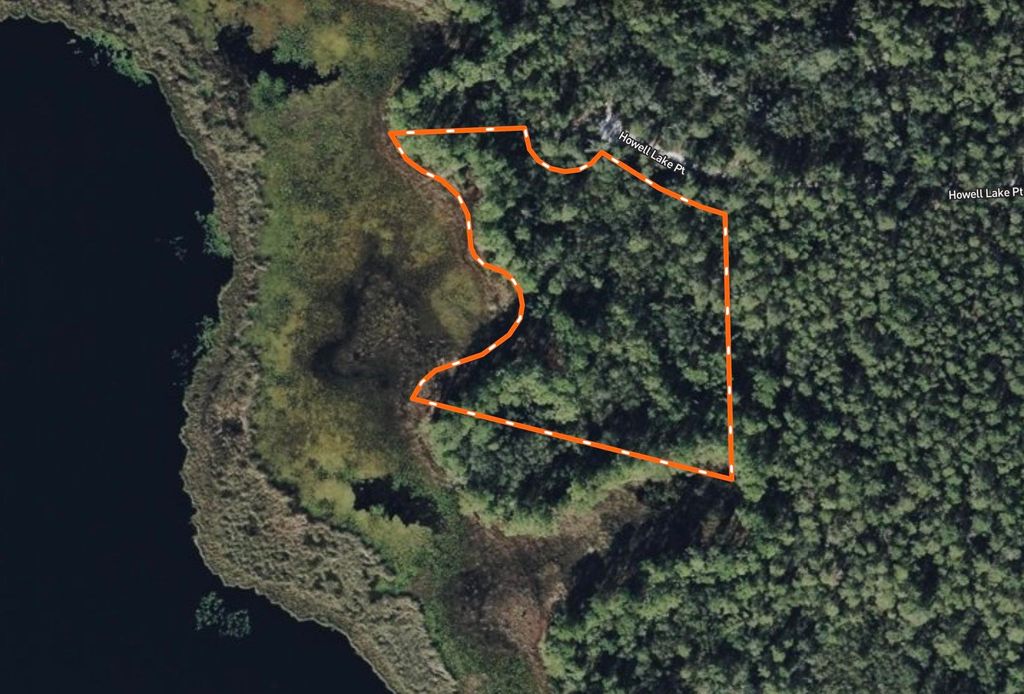 Photo of ***TBD*** Howell Lake Point, Other Florida, FL 32181 (MLS # 392178)