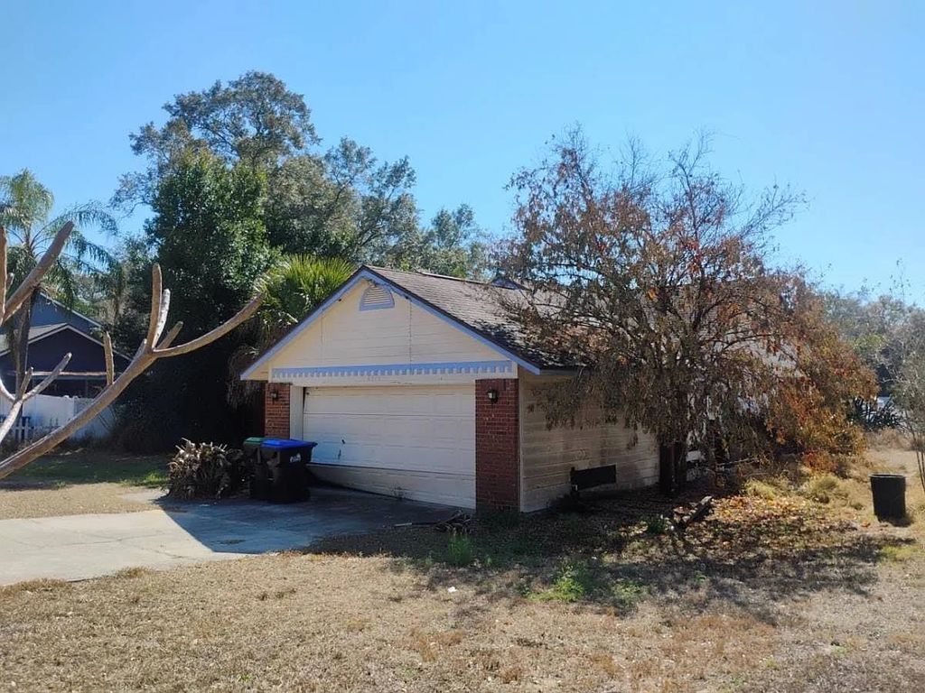 Photo of 6914 Thousand Oaks Road, Other Florida, FL 32818 (MLS # 396151)