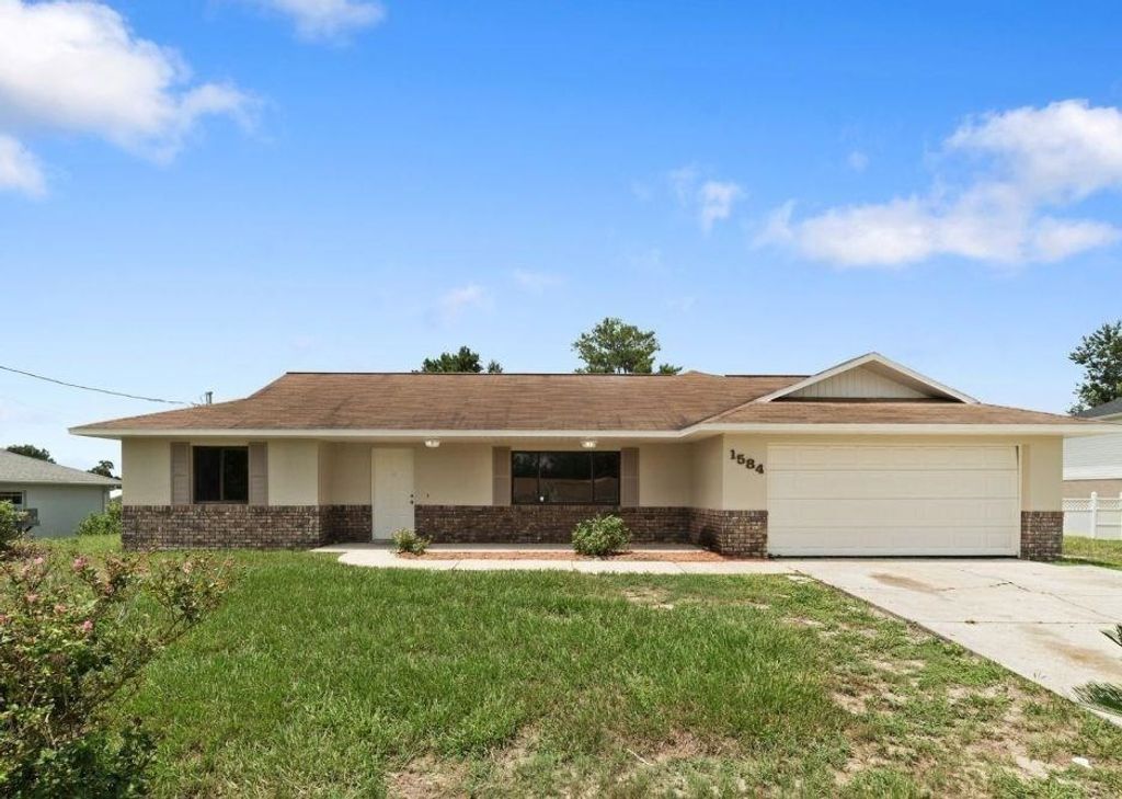 Photo of 1584 Bavon Drive, Other Florida, FL 32725 (MLS # 394475)