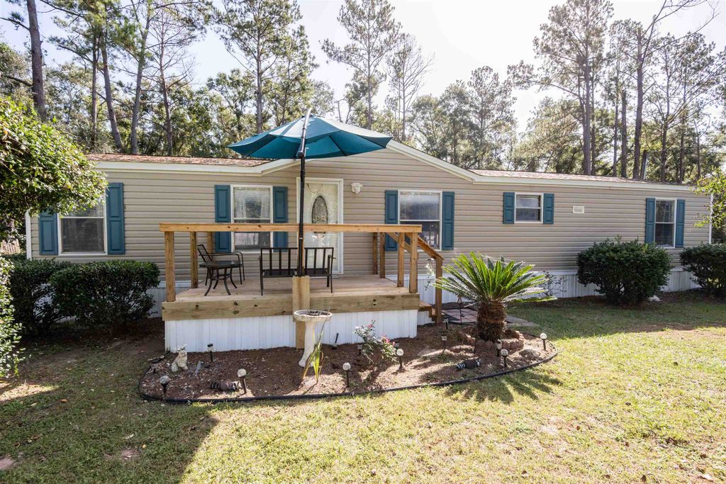 Photo of 10412 Roger Hamlin Road, Tallahassee, FL 32311 (MLS # 391800)