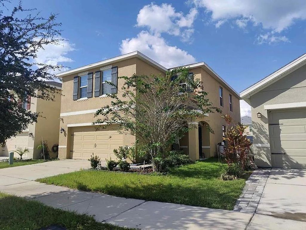 Photo of 10218 Geese Trail Circle, Other Florida, FL 33573 (MLS # 392474)