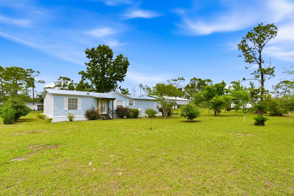 Photo of 813 E Charles Hendry Road, Perry, FL 32348 (MLS # 399817)