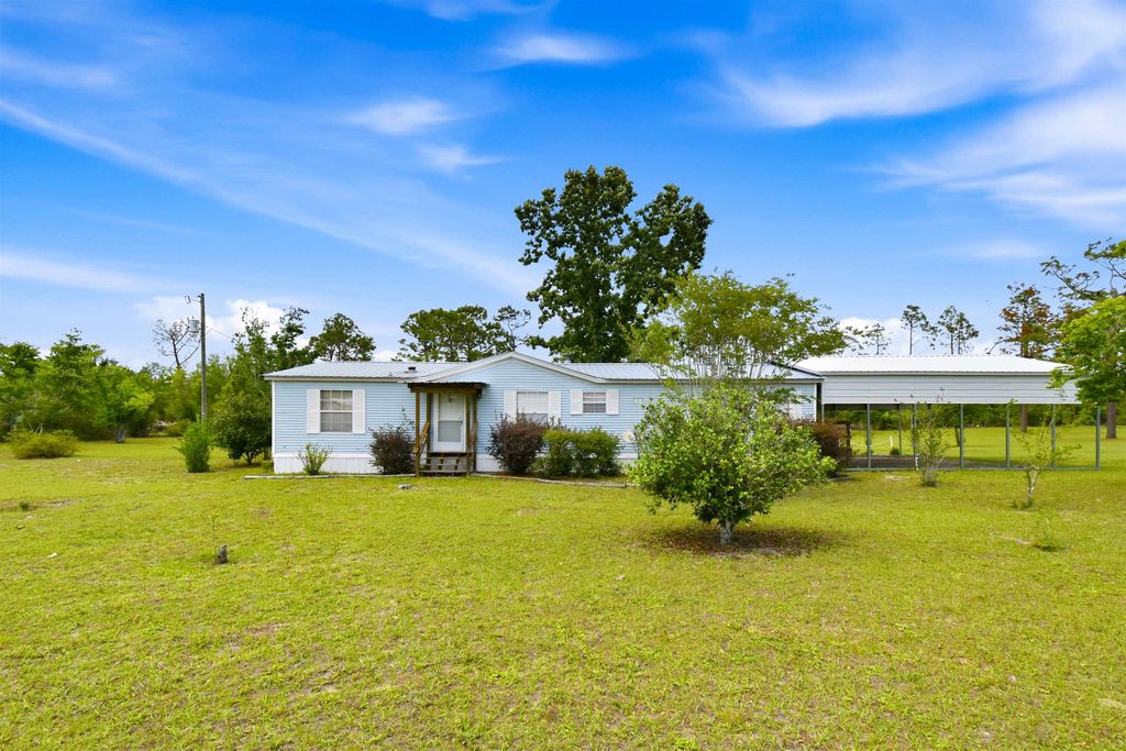 Photo of 813 E Charles Hendry Road, Perry, FL 32348 (MLS # 399817)