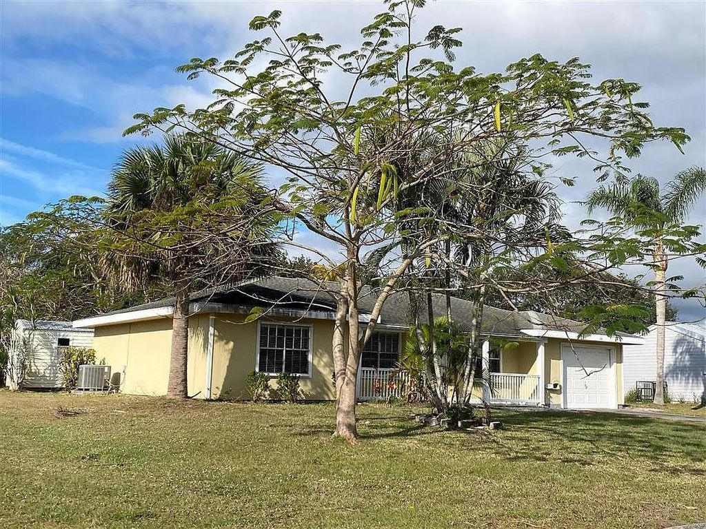 Photo of 1438 SE Marisol Lane, Other Florida, FL 34952 (MLS # 395833)