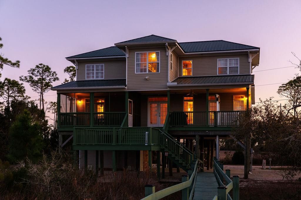 Photo of 588 River Road, Carrabelle, FL 32322 (MLS # 399827)