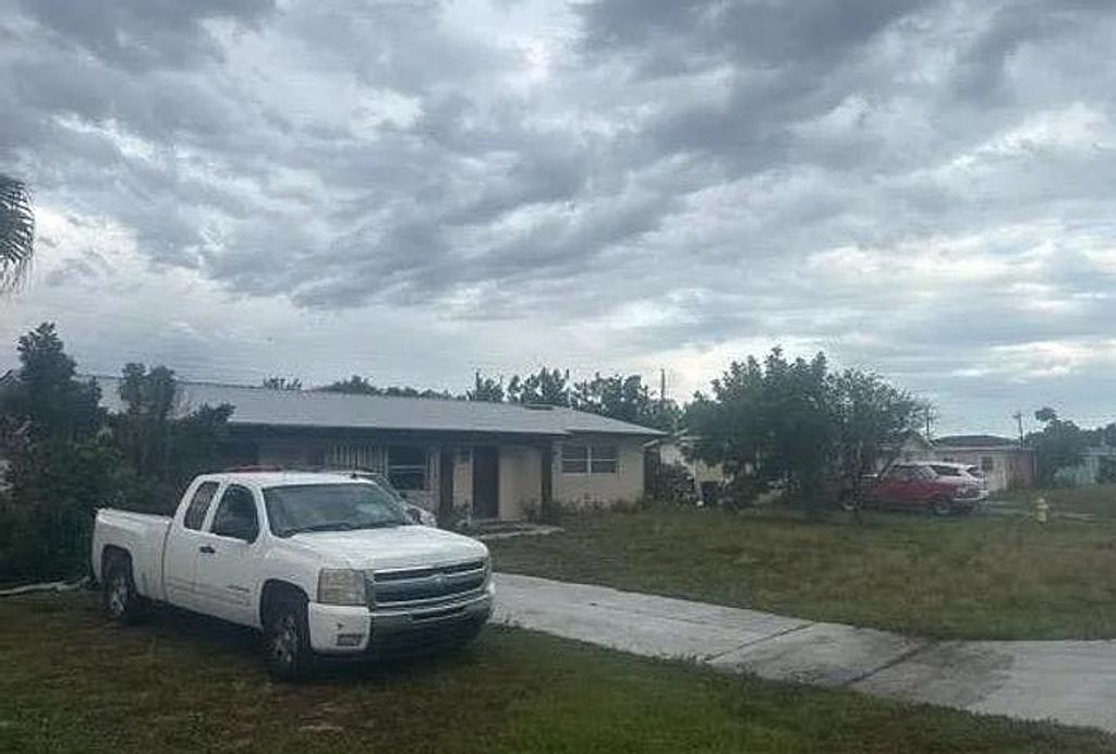 Photo of 331 S Hazelwood Avenue, Other Florida, FL 33936 (MLS # 400791)