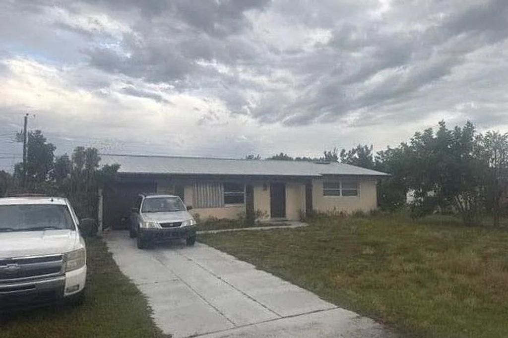 Photo of 331 S Hazelwood Avenue, Other Florida, FL 33936 (MLS # 400791)