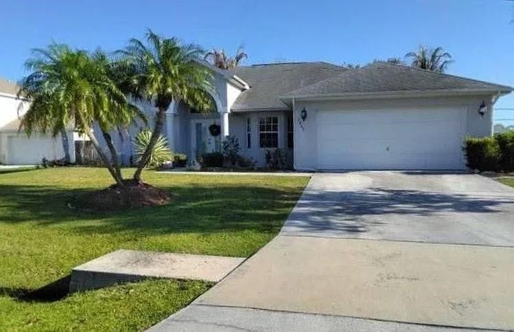 Photo of 1241 SW Mancuso Avenue, Other Florida, FL 34953 (MLS # 402311)