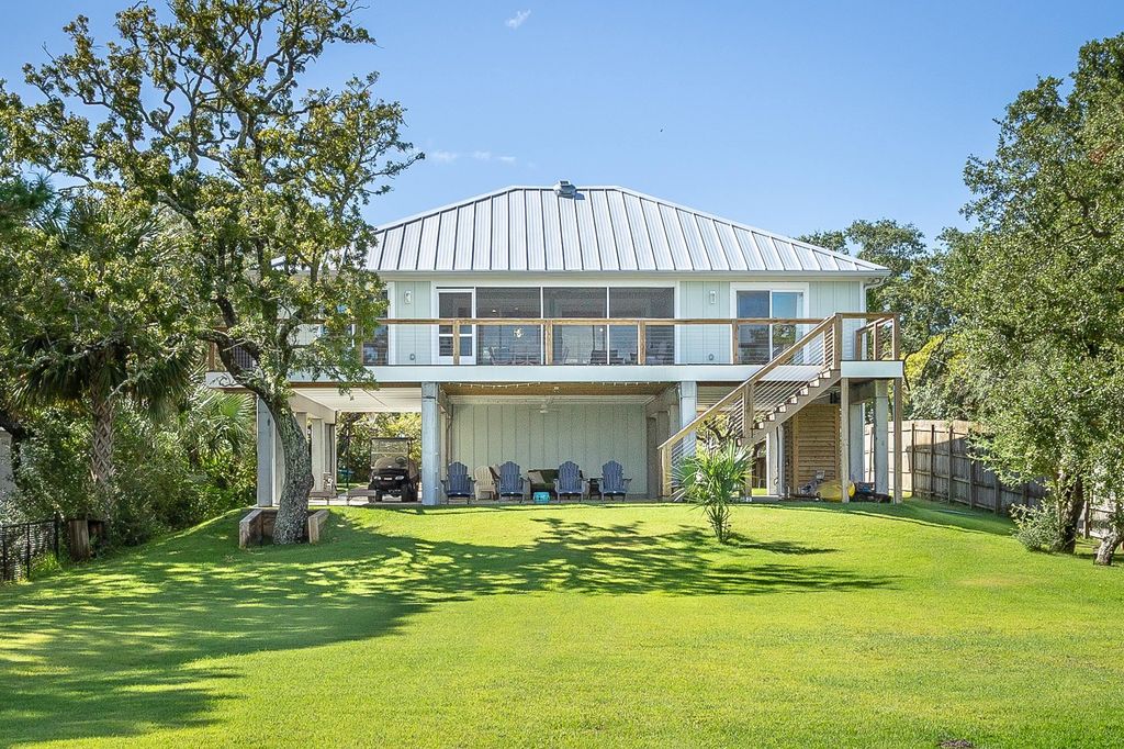 Photo of 143 Harbor Circle, Alligator Point, FL 32346 (MLS # 391636)