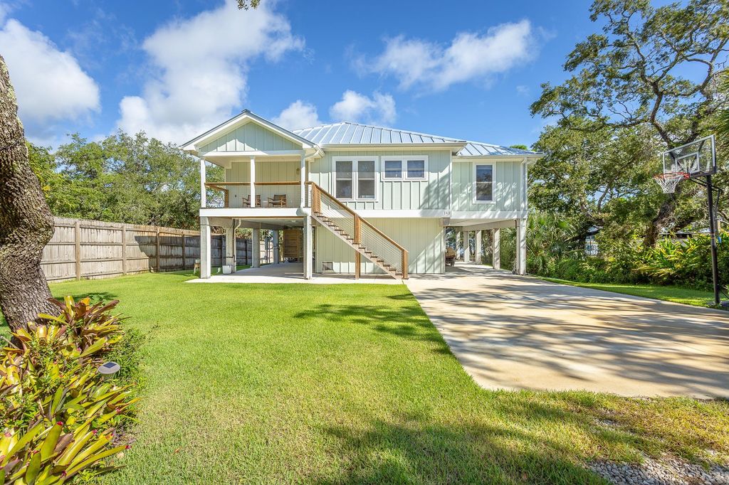 Photo of 143 Harbor Circle, Alligator Point, FL 32346 (MLS # 391636)
