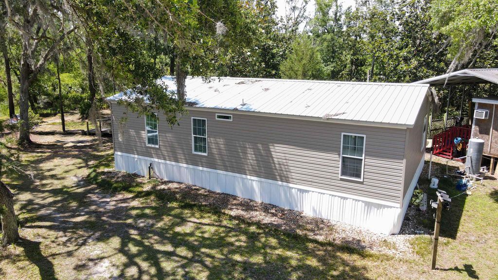 Photo of 2411 Lonnie Houck Road, Perry, FL 32348 (MLS # 388448)